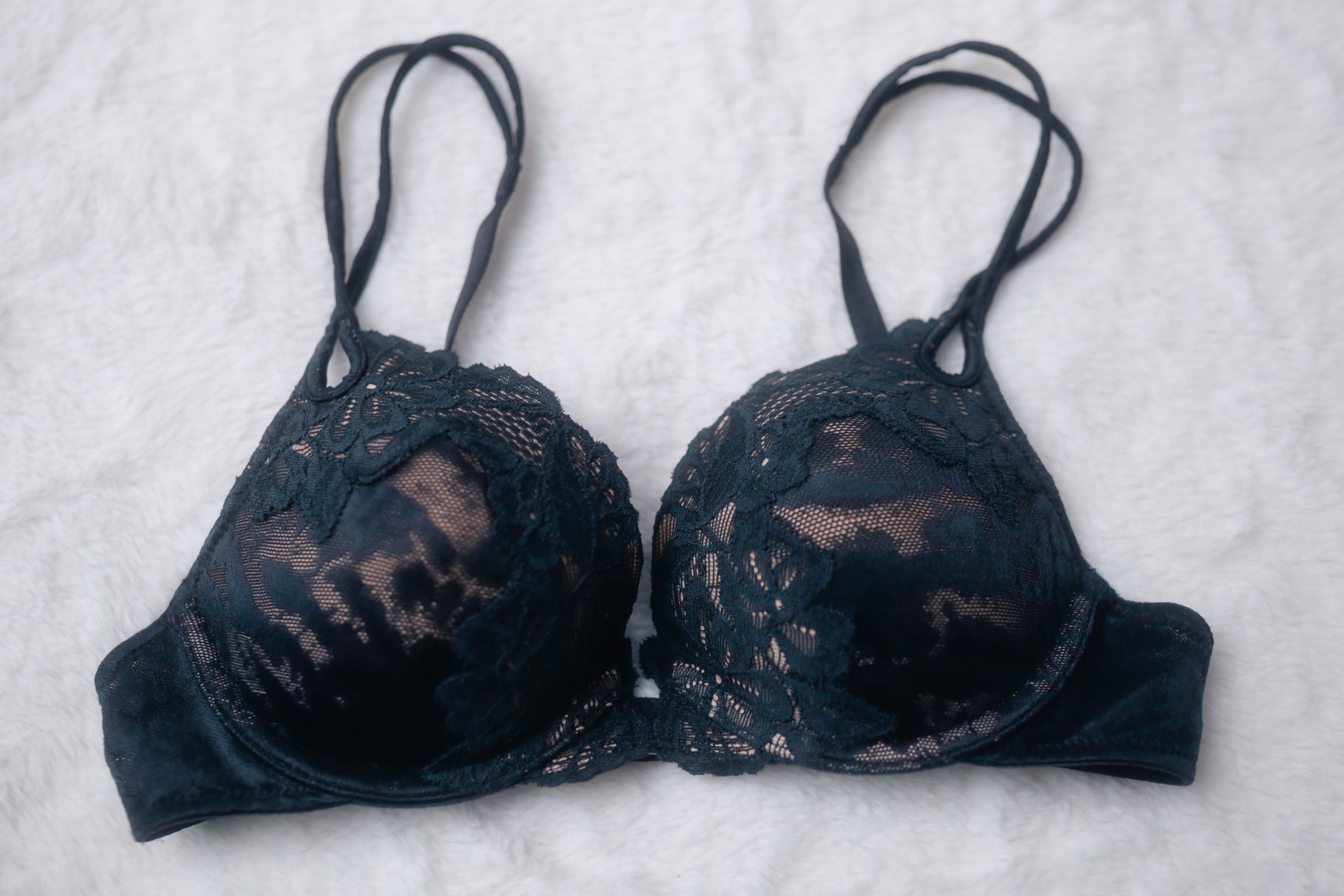 Victoria's Secret Vintage 32B Demi Push-up Bra with black lace overlay on beige cups, displayed on a white background